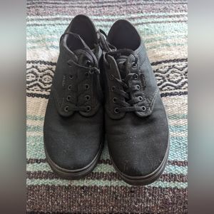 Solid black vans